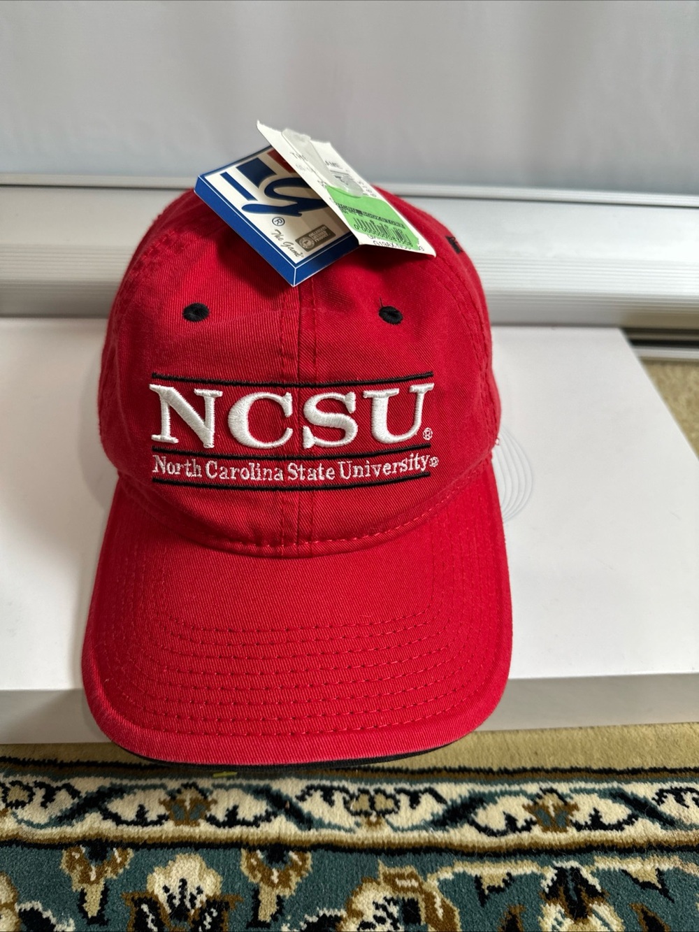 The Game Red Baseball Cap with White Embroidered Patch North Carolina State